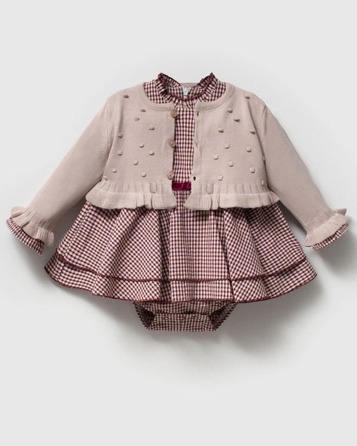 Baby girl dusty pink gingham romper dress with bobble knit cardigan, front view