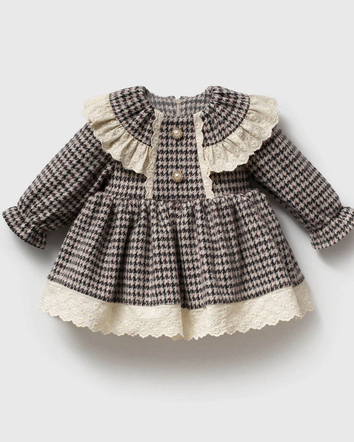 Baby girl black and ivory houndstooth dress with lace ruffle collar, front view
