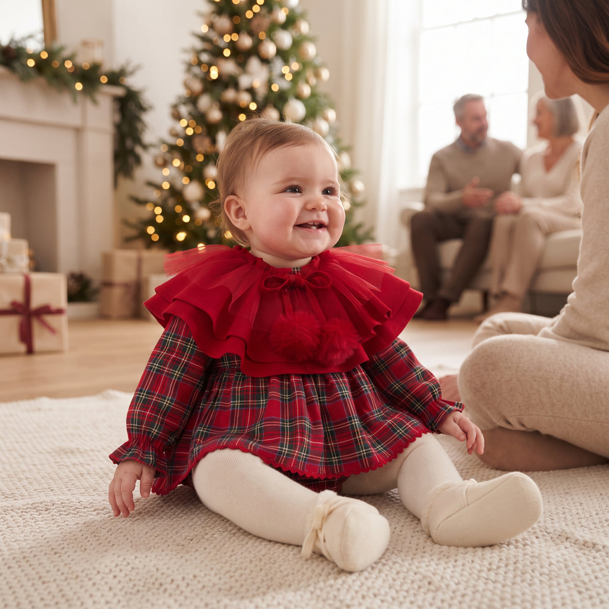 Baby girl red tartan romper dress with layered red tulle cape collar, front view