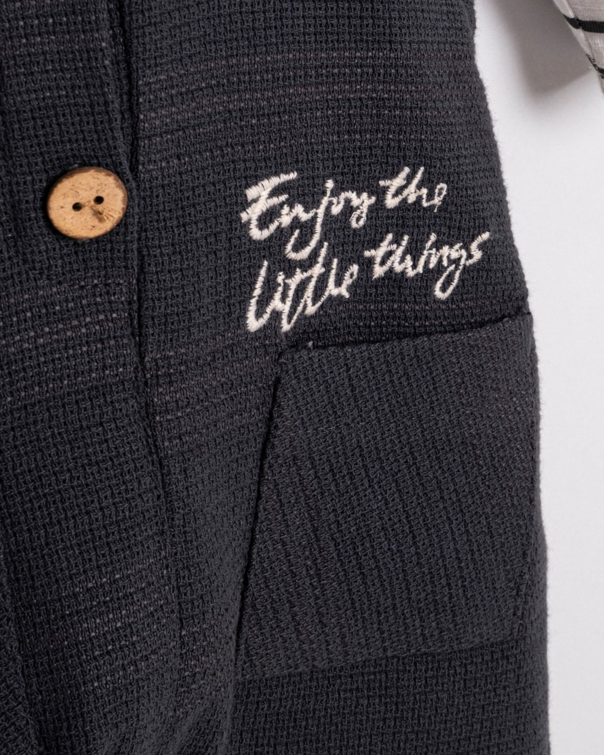 Patch pocket and "Enjoy the little things" embroidery on baby dungarees