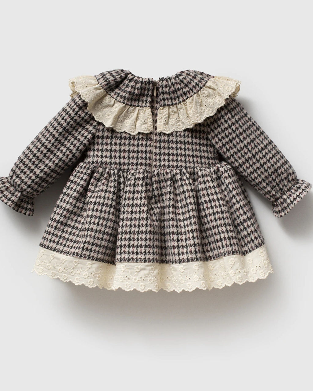 Back view of black houndstooth baby dress with gathered skirt