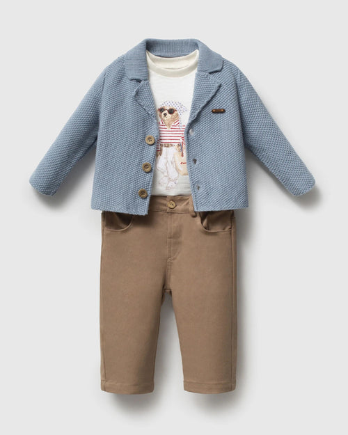 Close-up of knit texture and buttons on a baby boy blazer