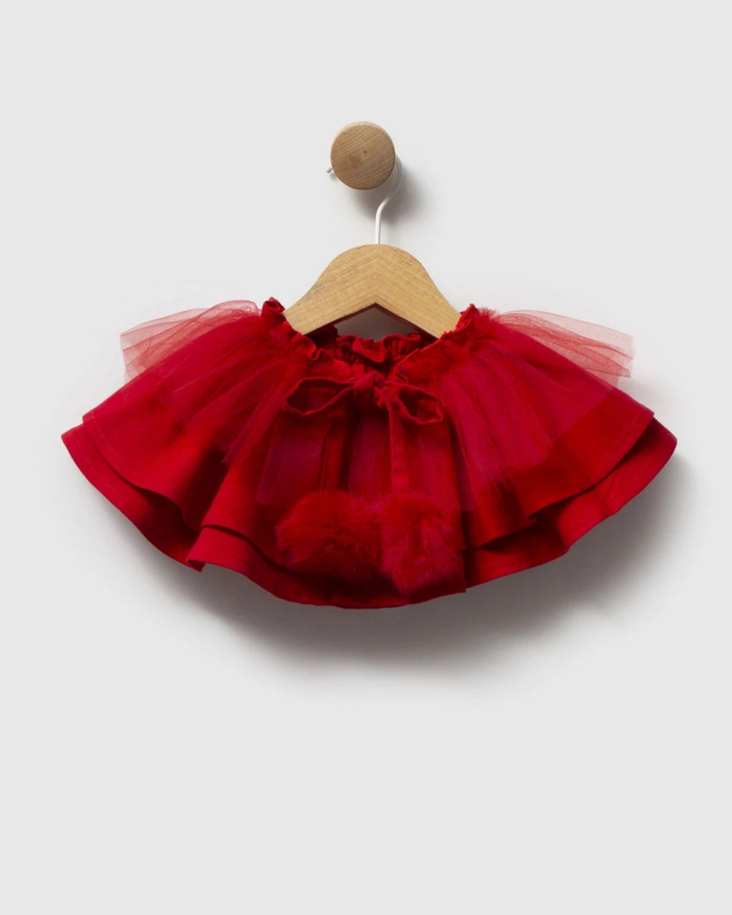 Layered red tulle cape collar with pom-pom ties for a baby girl