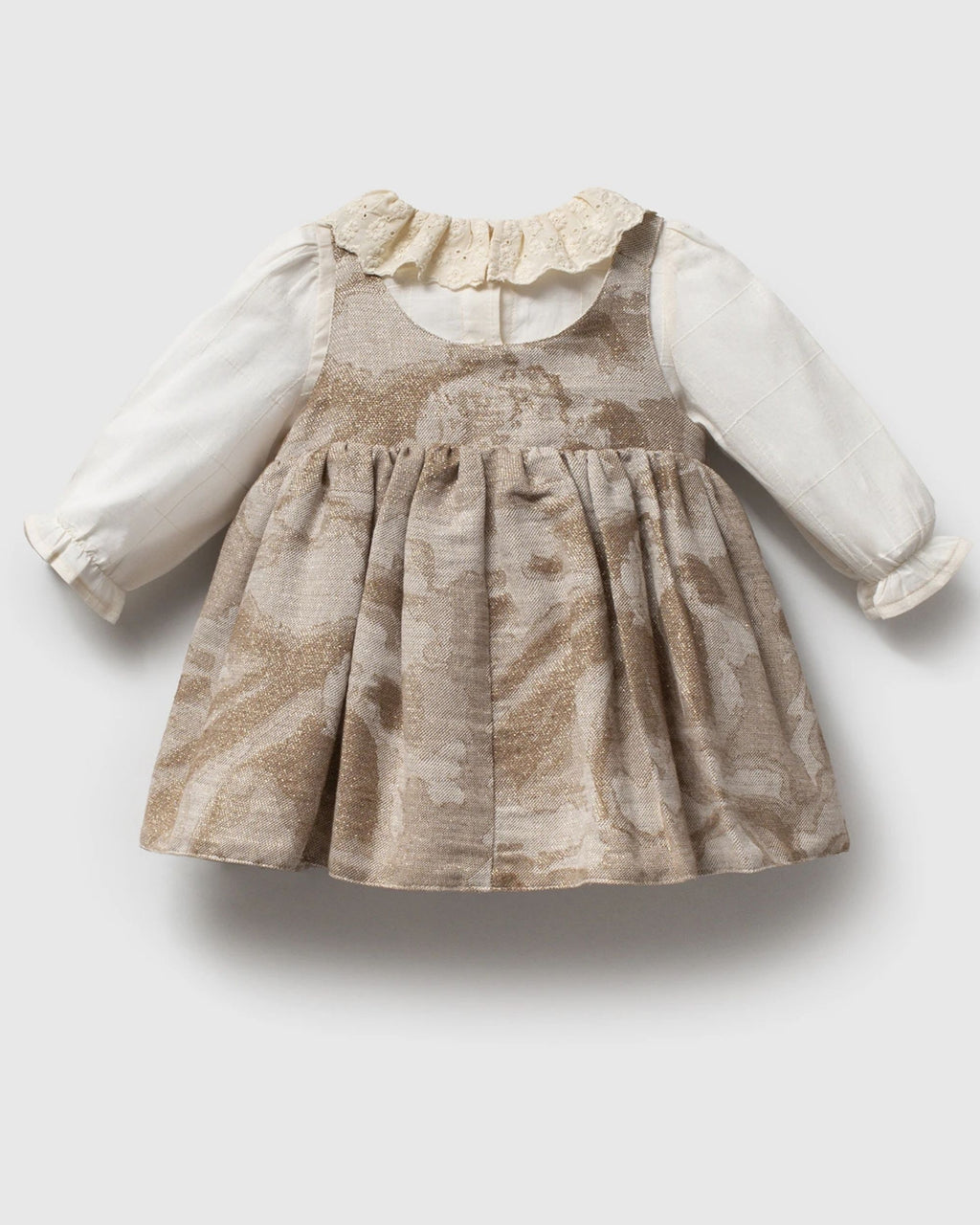 Back of taupe jacquard baby pinafore dress over ivory blouse